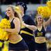 Michigan cheerleaders take the court before the start of the game at Cowboys Stadium on Sunday, March 31, 2013. Melanie Maxwell I AnnArbor.com